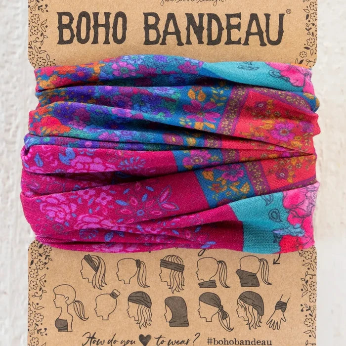 Pink boho bandana with intricate patterns, perfect for adding a stylish touch to any outfit.