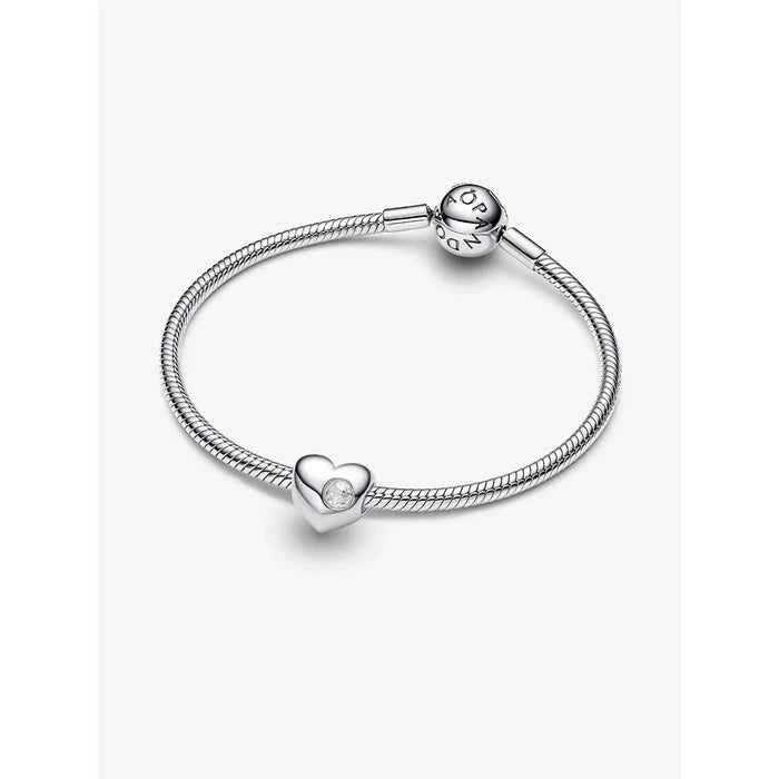 This Pandora April Engravable Clear Stone Heart Charm combines personalized meaning with elegant sparkle.