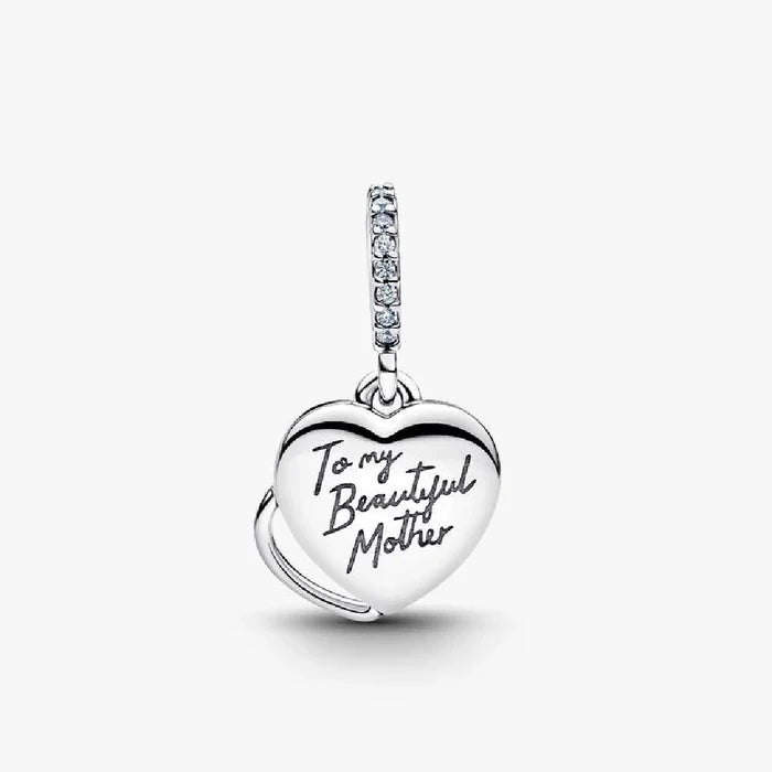 Heart-shaped Pandora charm featuring pink opal stones, highlighting a beautiful and stylish accessory.