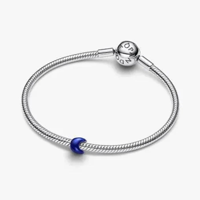 Blue Moon Mini Charm featuring a petite blue moon design