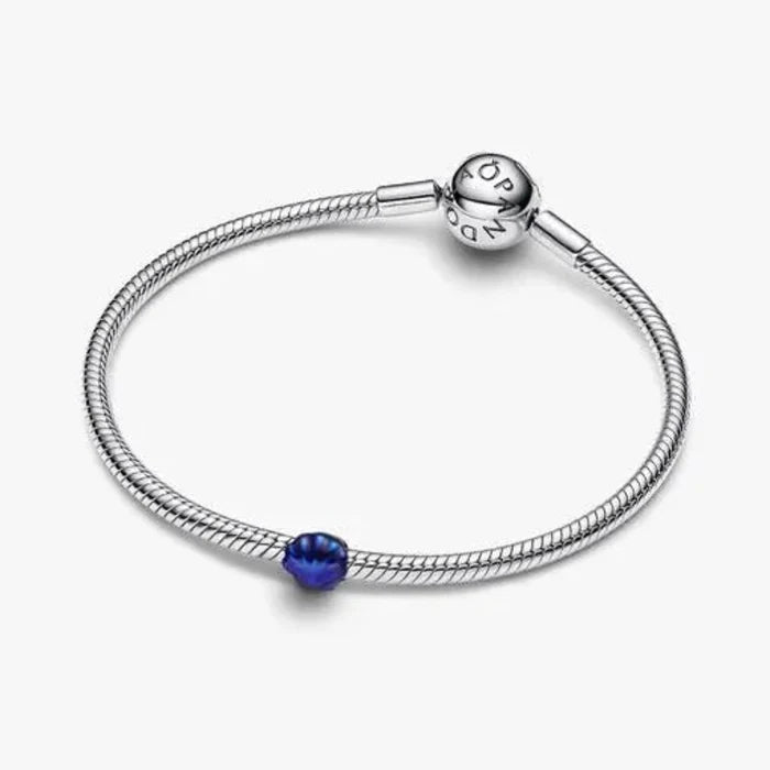 Blue Shell Mini Charm featuring a petite blue seashell design