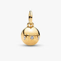 Gold "Mom" charm adorned with sparkling diamonds, showcasing a heartfelt tribute to motherhood.