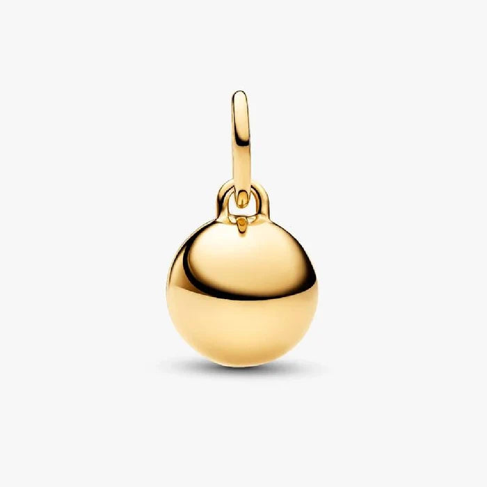 Elegant gold charm spelling "Mom," embellished with diamonds for a luxurious touch.