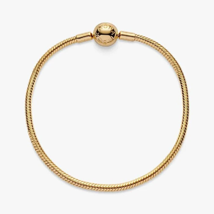 A stylish gold-plated bracelet with a tiny ball embellishment.