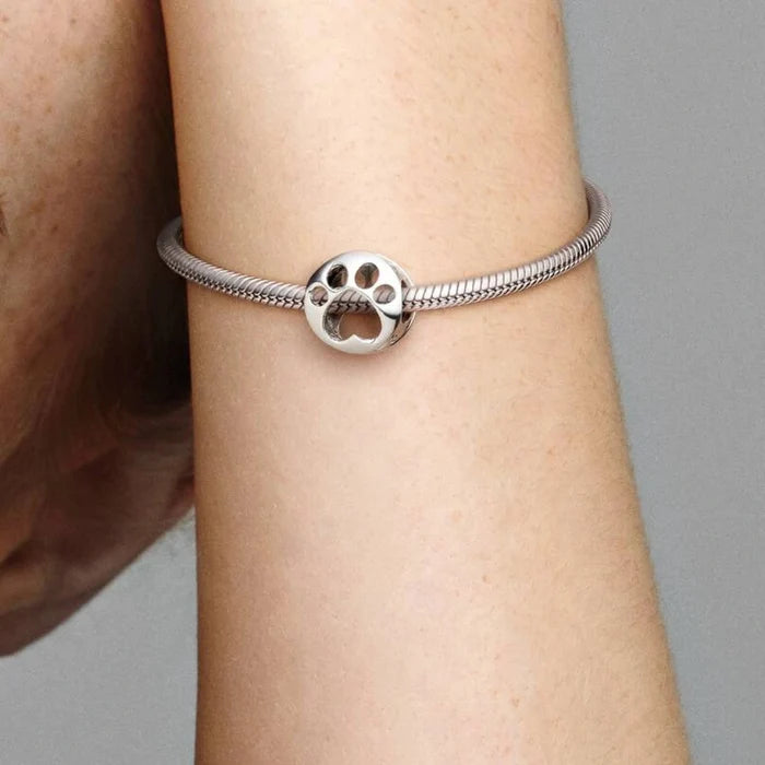 This dog paw print charm is the perfect gift for the fur mom that has everything.