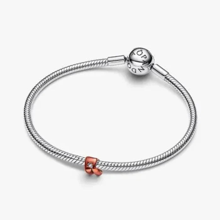 Orange Music Note Mini Charm featuring a vibrant orange musical note
