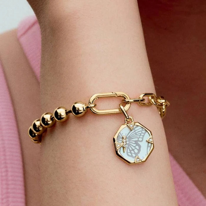 Choose this butterfly charm as a reminder to embrace new experiences.