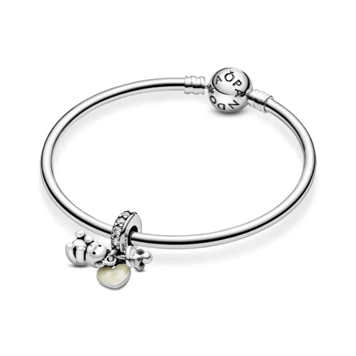 This Pandora Moments Baby Teddy Bear Charm adds a sweet and sentimental touch to your personalized jewelry collection.
