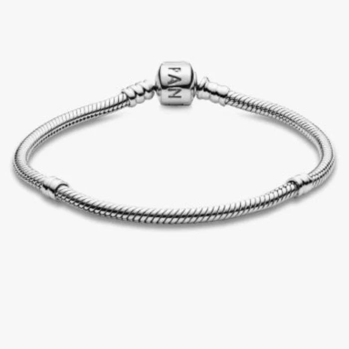 Pandora Moments Barrel Clasp Snake Chain Bracelet featuring a polished snake chain with a classic barrel clasp, designed for Pandora Moments charms and accessories.