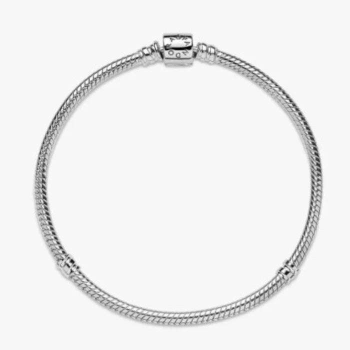 This Pandora Moments Barrel Clasp Snake Chain Bracelet offers a classic foundation for your favorite Pandora charms