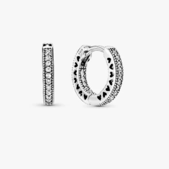 This Pandora Pavé Heart Hoop Earrings features a sparkling pavé heart crafted in sterling silver.