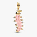 Pink stone charm adorned with diamonds, hanging from an elegant gold chain.