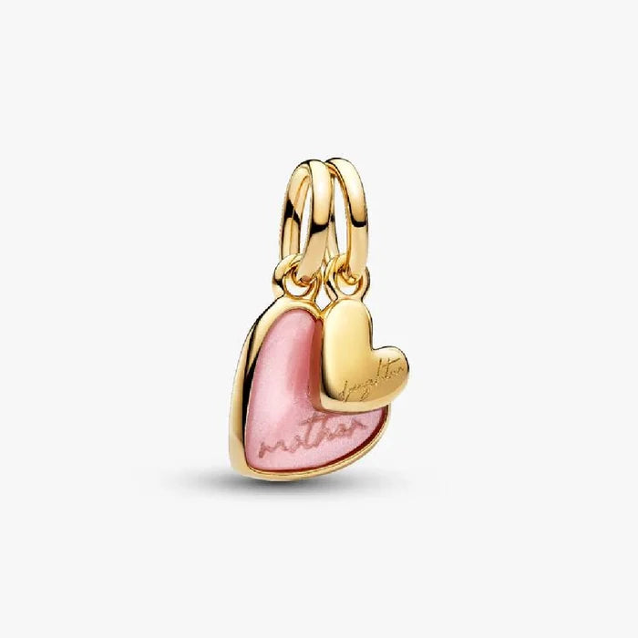 A heart charm featuring a glossy pink enamel finish, showcasing a vibrant and playful design.