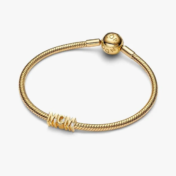 Yellow gold ring with a diamond, finished in rhodium plating, celebrating the bond between mother and child.