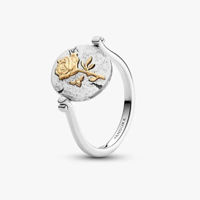 PANDORA Rose Reversible Medallion Ring crafted in sterling silver with 14k rose gold plating, featuring a rose design and engraved “ROSA INTER SPINAS CRESCIT” Latin inscription.