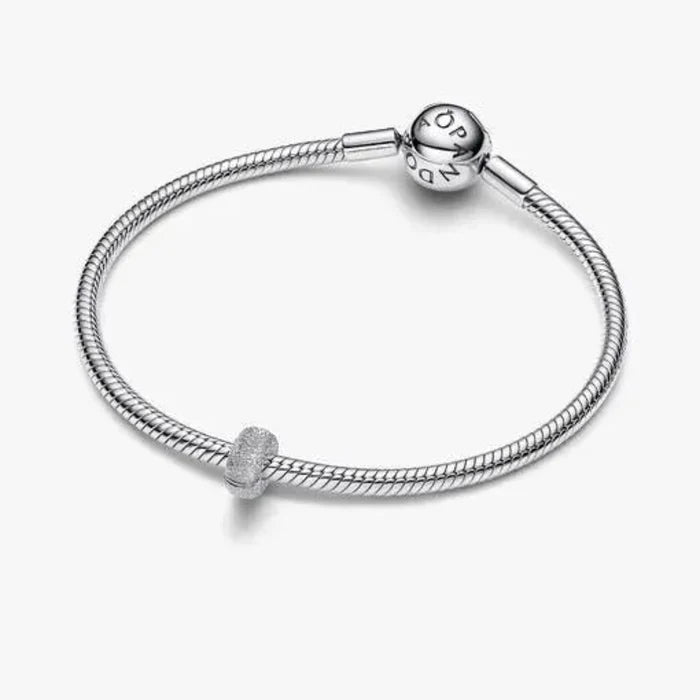 Textured Mini Clip Charm featuring a compact clip design
