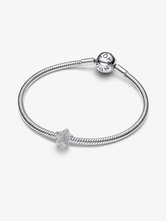 Pandora sterling silver snake chain bracelet featuring the textured star charm with logo clasp.