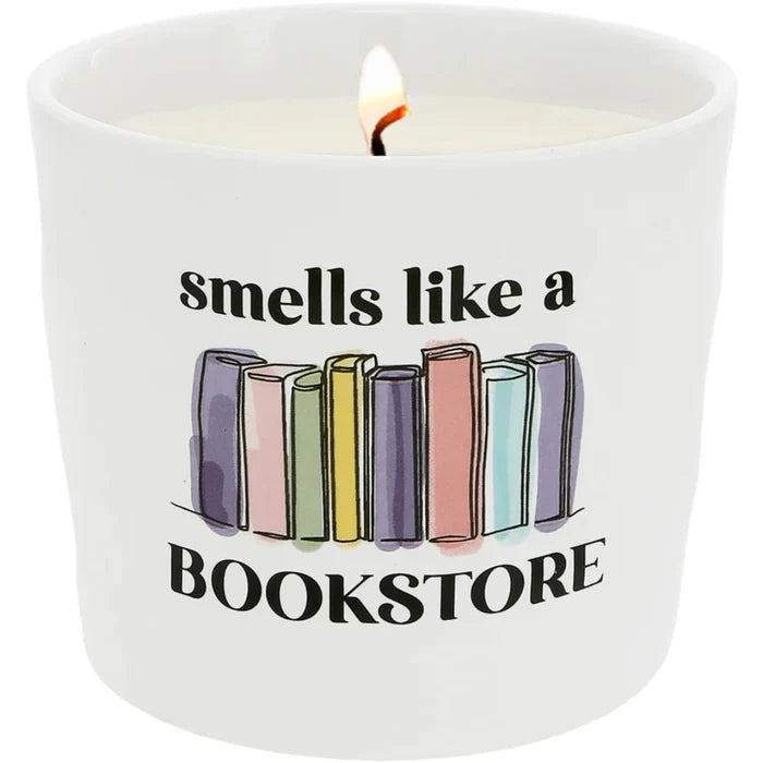 The Pavilion Gift Co Bookstore Whispering Pages 12 oz Soy Wax Candle captures the warm, nostalgic fragrance of old pages, wood, and quiet reading nooks.