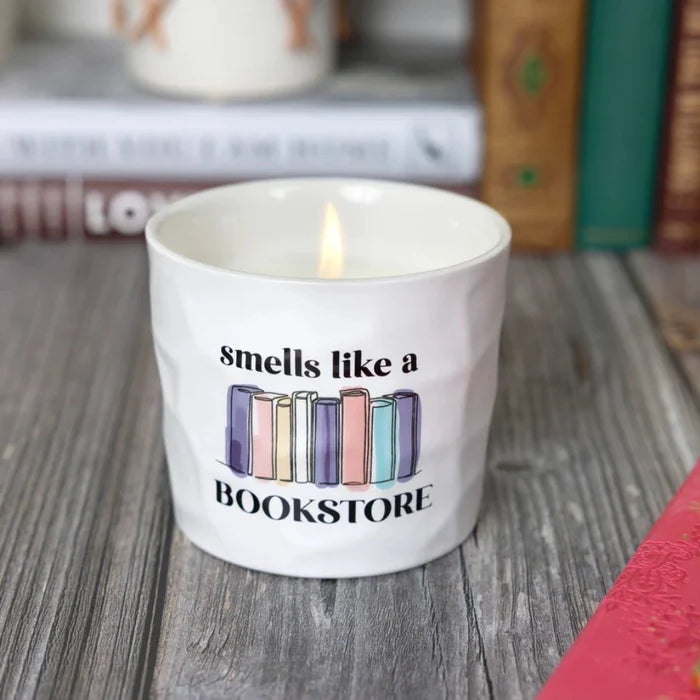 The Pavilion Gift Co Bookstore Whispering Pages 12 oz Soy Wax Candle captures the warm, nostalgic fragrance of old pages, wood, and quiet reading nooks.