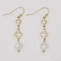 This Periwinkle Gold Clovers With White Crystal Earrings feature brilliant white crystal accents that catch the light beautifully