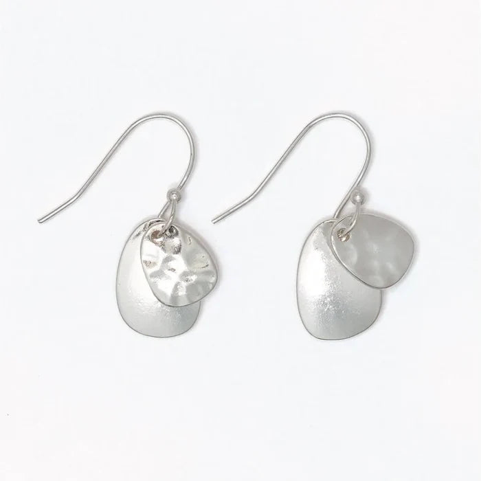 Hammered and polished silver layered earrings with a modern textured design