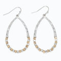 Periwinkle hammered silver two-tone beaded teardrop earrings featuring a textured finish and elegant dangling silhouette.