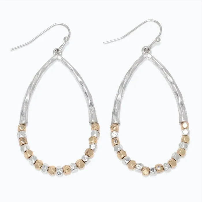 Periwinkle hammered silver two-tone beaded teardrop earrings featuring a textured finish and elegant dangling silhouette.