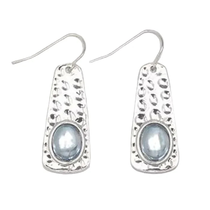 This Hammered Silver With Blue Inlay Earring by Periwinkle combines artisan craftsmanship with timeless Southwestern-inspired style.