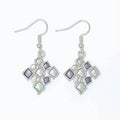Periwinkle silver openwork earrings featuring soft pastel shades in a delicate decorative design