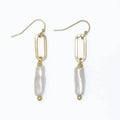 Periwinkle pearl drop earrings with delicate gold links and an elegant two-tone design