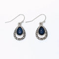 Periwinkle silver filigree drop earrings with navy inlay accents and an intricate openwork design