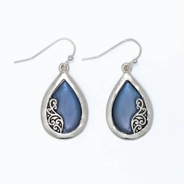 Periwinkle soft blue inlay earrings with intricate silver filigree detailing in an elegant drop design