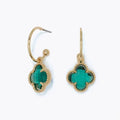 Periwinkle teal crystal clover earrings featuring a charming clover design with rich teal accents