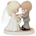 Romantic wedding figurine featuring a beautifully detailed bride and groom.