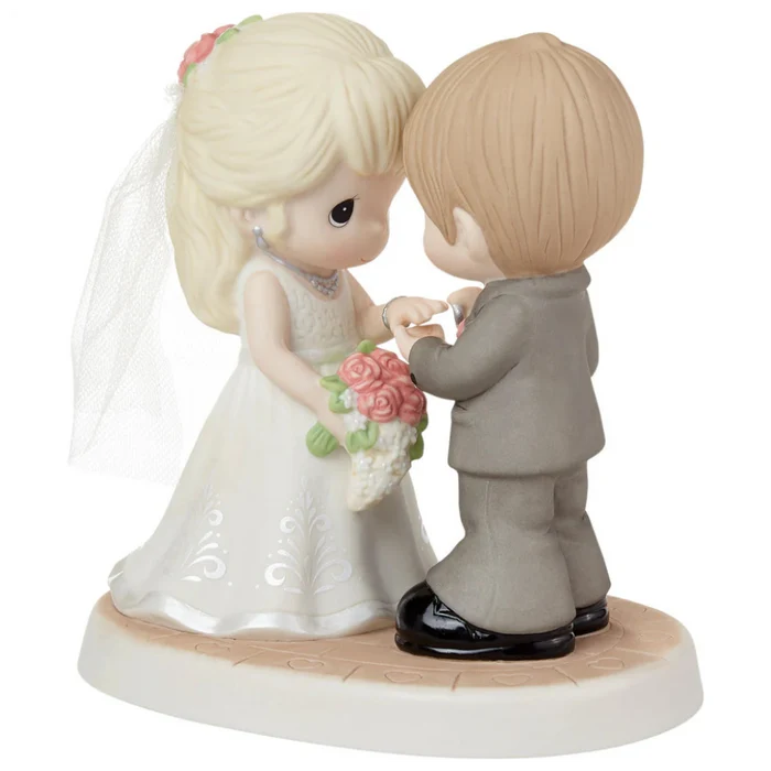 Romantic wedding figurine featuring a beautifully detailed bride and groom.