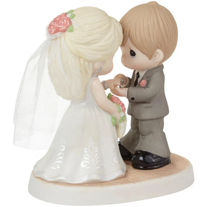 Romantic wedding figurine featuring a beautifully detailed bride and groom.