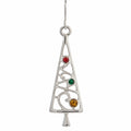 The open Christmas tree silhouette creates a lightweight, airy appearance while adding a playful seasonal touch.