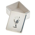A silver box containing a chalice and a silver cross, symbolizing religious significance and ceremonial use.