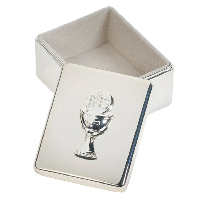 A silver box containing a chalice and a silver cross, symbolizing religious significance and ceremonial use.