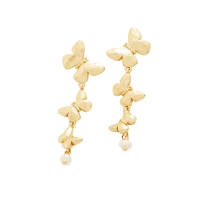 A pair of gold butterfly earrings with small pearl accents.