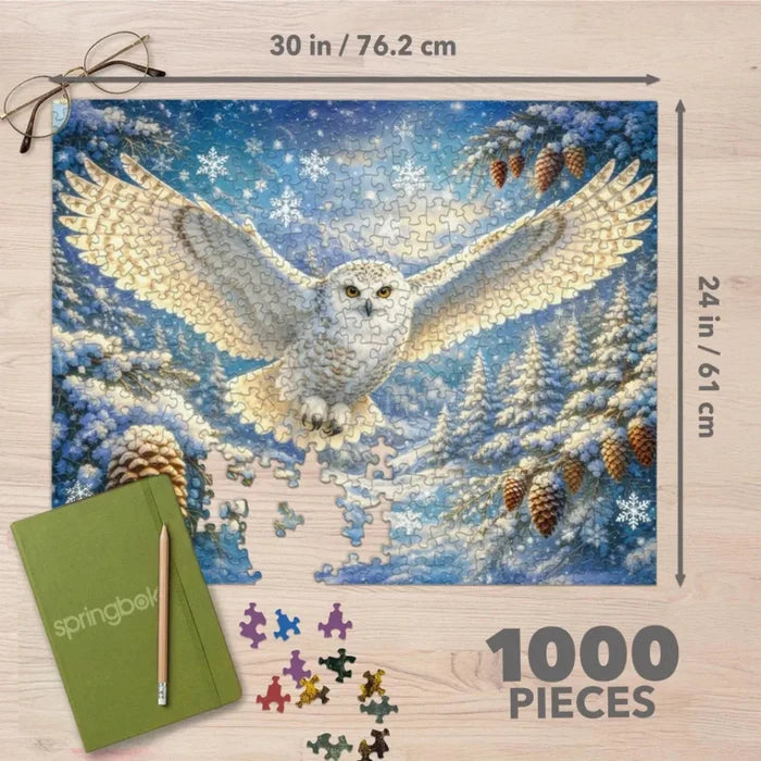 The Springbok Arctic Owl 1000 Piece Jigsaw Puzzle features stunning, high-detail artwork of a majestic snowy owl.