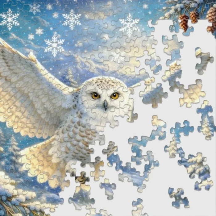 The Springbok Arctic Owl 1000 Piece Jigsaw Puzzle features stunning, high-detail artwork of a majestic snowy owl.