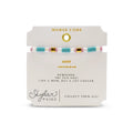 A colorful bracelet composed of glass and gold, highlighting a beautiful blend of hues in its design.