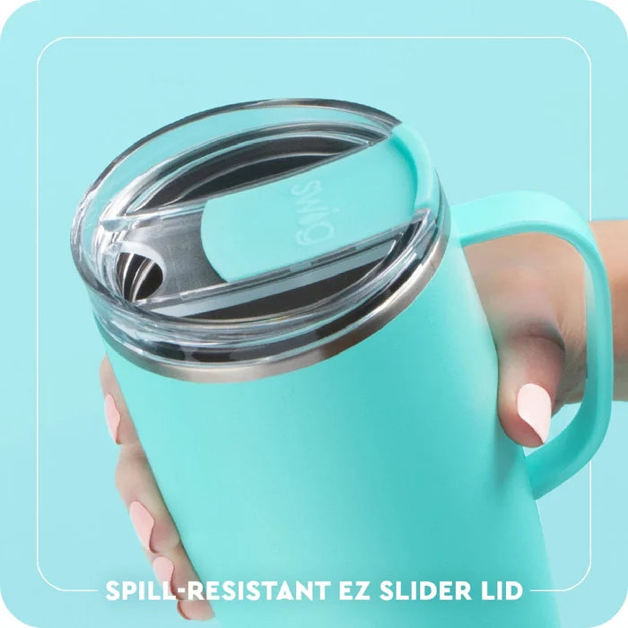 A white travel mug adorned with a bright, eye-catching pattern.