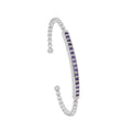 This rhodium-finished cuff features a striking pave bar detail that catches the light beautifully