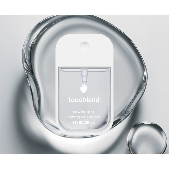 Touchland unscented hand sanitizer power mist packaging on a gray background