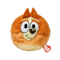 A stuffed animal featuring an orange face and eyes, showcasing a playful and cheerful expression.