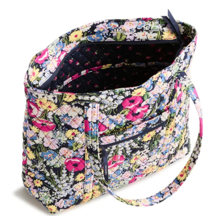 This classic large tote pairs effortless style with everyday practicality, offering generous space
