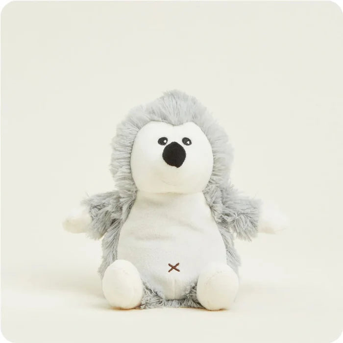 Plush toy hedgehog on a white background
