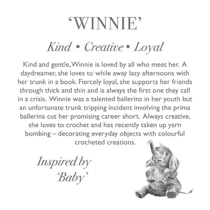 A soft, gray stuffed elephant is positioned on a white background, emphasizing its adorable design and plush material.